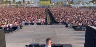 DJ Fercho Energy actuando frente a una multitud en un festival