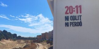 Pintada que dice 20:11 ni oblit ni perdó en un muro
