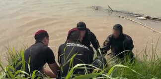 Policía Nacional rescate de un cadáver en el rio Túria a la altura de Manises