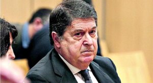 José Luis Olivas Martínez en un evento formal, con expresión seria.