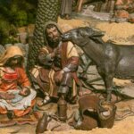 Escena del nacimiento de Jesús con figuras en un pesebre