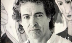 Retrato del pintor Antonio Camaró con fondo artístico