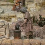 Escena de un artesano herrero trabajando en su taller.