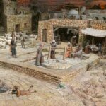 Representación de una escena de natividad en un pueblo antiguo.