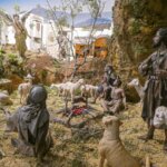 Representación de pastores con un ángel en un paisaje rural