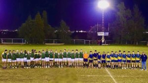 Equipos de rugby alineados en el campo durante la I HRC International Rugby Cup