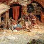 Escena del nacimiento en un belén tradicional con figuras de la Sagrada Familia.