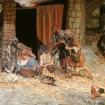 Escena del nacimiento de Jesús con pastores y animales.