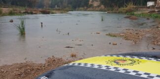 Vista de un río en Paterna durante una lluvia intensa