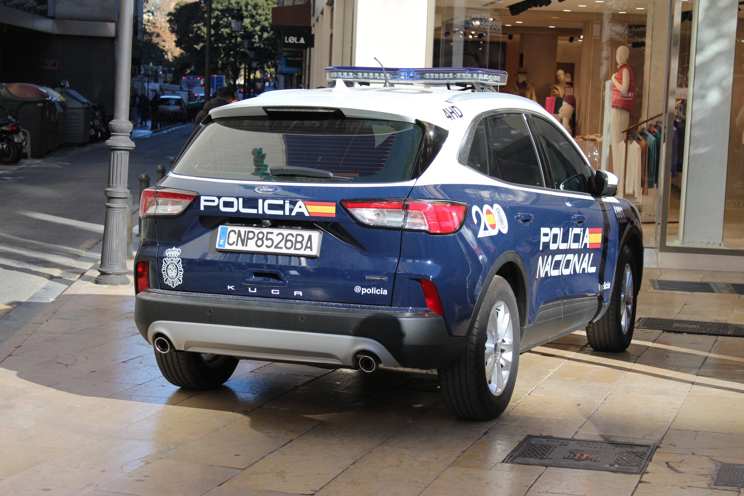 Vehículo de la Policía Nacional en una calle de Valencia