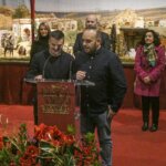 Presentación de un evento navideño en Valencia con un belén