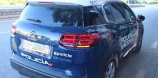 Coche de la Policía Nacional en una carretera de Valencia
