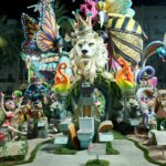 Fallas 2026 con figuras coloridas y monumentos artísticos